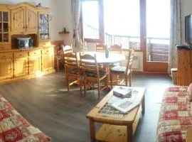 Appartement en résidence skis aux pieds avec sauna