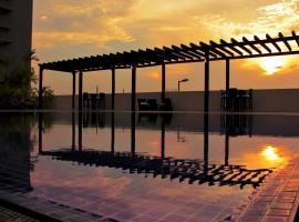 Hotel Trinitarias Suites，位于Barquisimeto的酒店