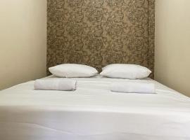CK Homestay Syariah near Lippo Plaza Jambi Mitra RedDoorz，位于Paalmerah的酒店