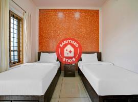 Capital O 87243 Kallada Residency，位于奎隆的酒店