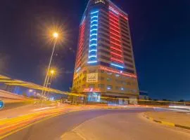 阿吉曼伊万套房酒店，位于阿吉曼沙迦国际机场 - SHJ附近的酒店