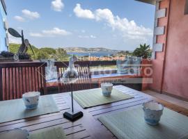 23 BAIA FARO - Trilocale mansardato con ampia terrazza vista mare，位于帕劳的度假屋