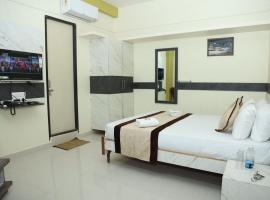 M R Residency Belagavi，位于贝尔高姆的酒店