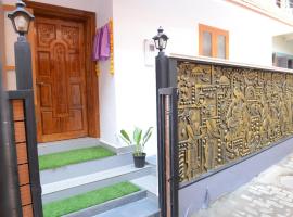 Ekana Homes，位于特里凡得琅阿图卡尔神庙附近的酒店