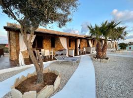 Dammusi cala croce，位于兰佩杜萨Cala Croce Beach附近的酒店