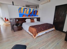 Habitat Suites Hotel By GHO Hoteles，位于佩雷拉的酒店