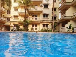 Seacoast Retreat- Lovely 2 BHK apartment with pool