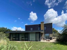 Luxe 8 persoons ‘Golfvillatexel’ vlakbij zee，位于德科克斯多普的酒店