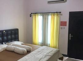 Marthine Residence Syariah RedPartner，位于占碑市的酒店