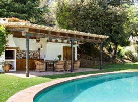 CASA EL MOLI DE CAN BURJATS con piscina y chimenea，位于Montrás的酒店