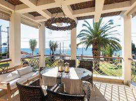 #FLH - Vitamin Sea Beachfront Villa, Sithonia，位于梅塔诺佛希斯的度假屋