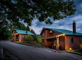 木屋莱克乌瑞希村公寓式酒店，位于卡尔派尼西翁的酒店