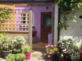 Cute self-contained guest room with ensuite and private decked porch in Glastonbury