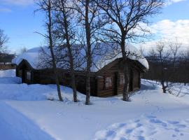 Cozy cabin at Beitost&oslash;len with sauna, hot tub & fireplace，位于贝特斯托尔的带热水浴缸的酒店