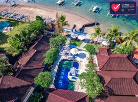 巴厘岛海景海滩俱乐部酒店，位于甘地达萨的酒店