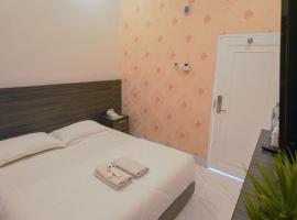 Wisma D’King RedPartner，位于Pangkajene的酒店