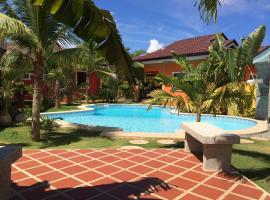 阿罗那珊瑚花园度假村服务式公寓，位于邦劳的自助式住宿