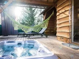 Charmante Cabane dans les arbres avec jacuzzi et sauna