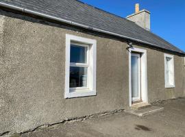 2 Bedroom house overlooking Pierowall Bay, Westray，位于皮耶罗沃尔霍华纳遗址附近的酒店