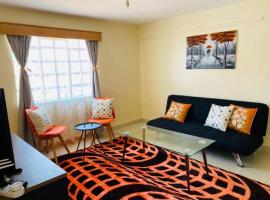 Lovely apartment near town with WiFi and parking，位于Meru的公寓
