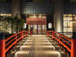 大阪心斋桥桥梁酒店，位于大阪Horie River Monument附近的酒店