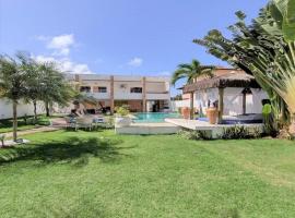 Maravilhosa casa de praia,cama balinesa，位于伊比拉奎拉的酒店