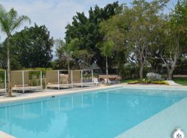 Rancho Macloy Hotel Spa & Social Events，位于尧特佩克的酒店