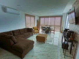 Hermoso Apartamento Vacacional para 6 PERSONAS, 2 NOCHES MINIMO，位于里奥阿托的海滩短租房
