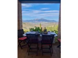 Sunny hillside casita in Guaro