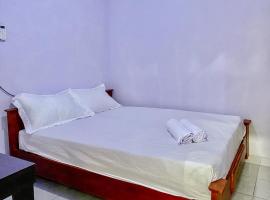 Griya Asri Syariah Mitra RedDoorz，位于Rogojampi的酒店