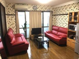 Cozy Family room KY apartment，位于那霸的酒店