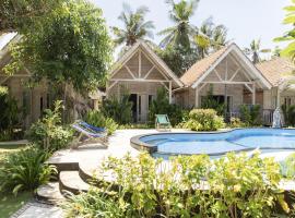 Coconut Village Guest House Lembongan RedPartner，位于蓝梦岛蓝角附近的酒店