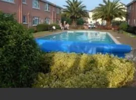 Apartment with heated pool & close to beach