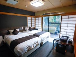 LiVEMAX RESORT Okudogo，位于松山Takanawa Mountain附近的酒店