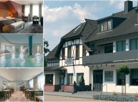 普吕泽尔客栈酒店及餐厅，位于Hellwege的酒店