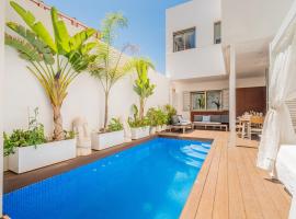 VLVilla - Villa de lujo en Valencia con piscina privada y sala de cine，位于布尔哈索特的带按摩浴缸的酒店