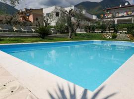 Borgo degli Ulivi Residence di Olympic Garda Lake，位于托斯科拉诺-马德尔诺的公寓式酒店