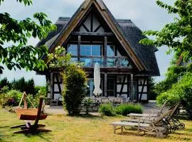 Landhaus am Achterwasser mit Bootssteg
