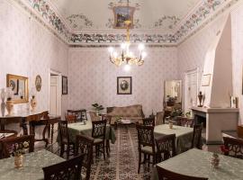 骑士王二世宫殿魅力住宿加早餐酒店，位于莫迪卡的酒店