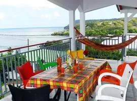 Appartement de 2 chambres avec vue sur la mer jardin clos et wifi a Deshaies