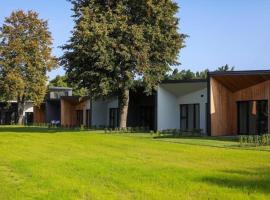Seaside bungalow Juura at Albatross, Kesterciems with garden, Spa and pool for extra