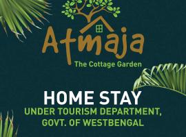 Atmaja The Cottage Garden Home Stay Malda Under Tourism Department Government of West Bengal，位于Māldah的山林小屋