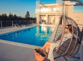 IO Luxury Pool & Hot Tub Suites，位于普雷韦扎的公寓式酒店
