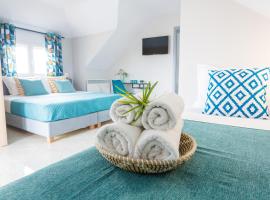 Joya Ofrynio Stylish Suites，位于奥弗里安的酒店