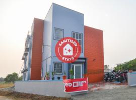 OYO 70546 Happy Inn，位于Madukkarai的酒店