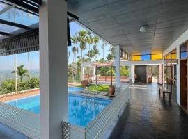 Aambal Villa Homestay，位于米南加迪的家庭/亲子酒店