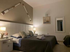 AQUARAMA Rooms & Apartments，位于Torre Squillace的酒店