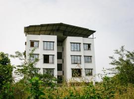 SPOT ON Pawan Villa，位于Gorhe的酒店