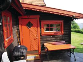阿斯加德斯特兰德达姆特度假屋，位于奥斯高特兰的酒店