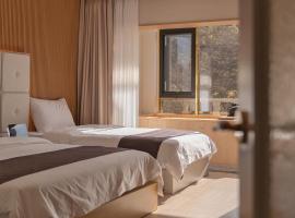 Denbasta forest Hotel，位于釜山的酒店